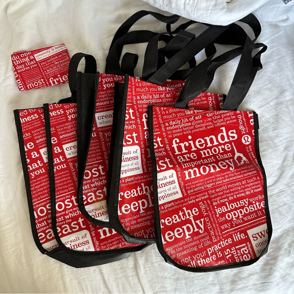 Bundle of 5 lululemon shopping bags + card holder